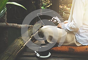 Young asia muslim woman work out office chill on green nature pa