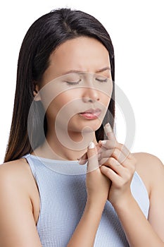 Young Asian American woman with injjured finger on white background