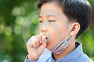 Young asian boy with face mask
