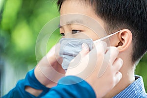 Young asian boy with face mask