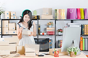 Young Asian business lady at office