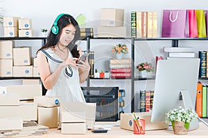 Young Asian business lady at office