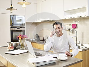 Young asian business man working from home