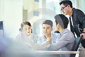 Young asian business people meeting in office