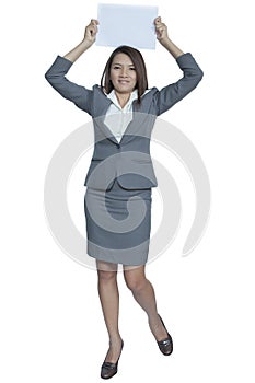 Young Asian business woman attractive brunetee showing blank signboard