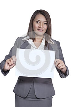 Young Asian business woman attractive brunetee showing blank signboard