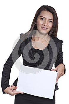 Young Asian business woman attractive brunetee showing blank signboard