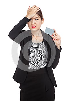 Young Asian business woman headache with a blank card
