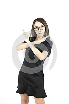 Young asian business woman made the gesture reject ,stop sign or x cross hands sign.