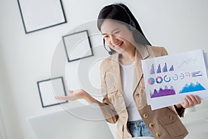 Young asian business woman using laptop computer for video conference online, businesswoman working with video call.