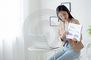 Young asian business woman using laptop computer for video conference online, businesswoman working with video call for meeting.