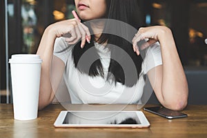 Young asian business woman working with tablet laptop, phone and