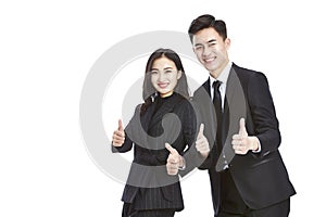 young asian businessman and businesswoman showing the two-thumbs-up sign