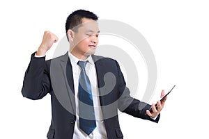 Young Asian businessman celebrating Successful. Businessman happy and smile with Arms up while standing