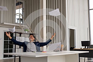 Young asian Businessman Congratulations and threw the documents Paper flying