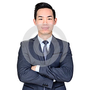 Young Asian businessman crossing his arms