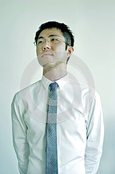 Young Asian Businessman Listen