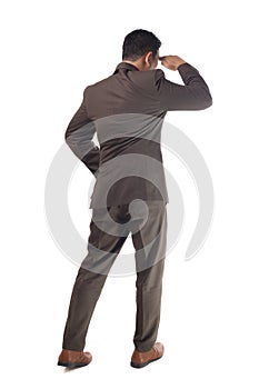 Young Asian Businessman Looking Forward Gesture, Rear View