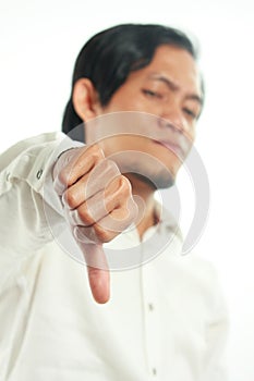 Young Asian Businessman Showing Thumb Down