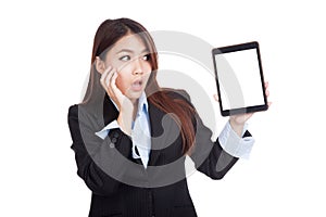 Young Asian businesswoman shock show tablet pc