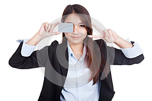 Young Asian businesswoman show victory sign and blank card