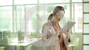 Young asian businesswoman working in office