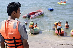 Young asian canoe instructor