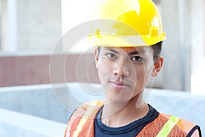 Young asian construction worker