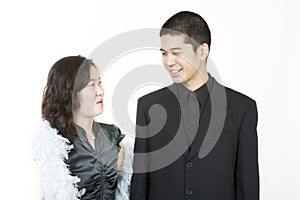 Young asian couple dressed up