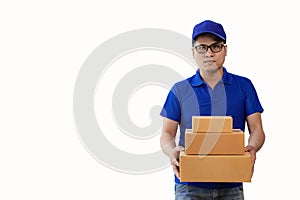Young Asian delivery man holding a cardboard box Image of delivery boy