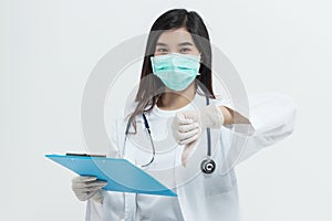 Young Asian doctor woman wearing doctor gown uniform coat , medical mask and stethoscope holding a clipboard looking unhappy