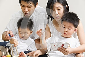 Young Asian family spending time together