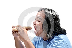 Young asian fat man eating fast food slice of pizza