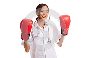 Young Asian female doctor ready to fight