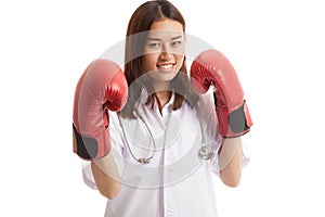 Young Asian female doctor ready to fight.