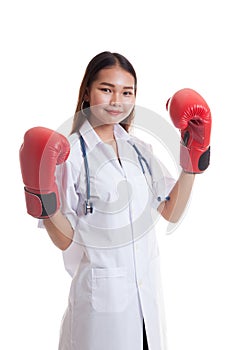 Young Asian female doctor ready to fight.