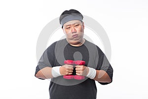 Young Asian funny fat sport man exercise with dumbbell isolated on white background.