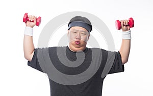 Young Asian funny fat sport man exercise with dumbbell isolated on white background.