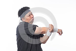 Young Asian funny fat sport man stretching before exercise isolated on white background.