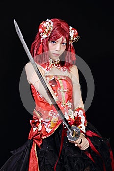 Young asian girl dressed in cosplay costume