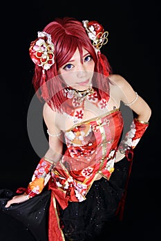 Young asian girl dressed in cosplay costume