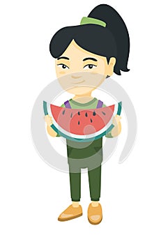 Young asian girl eating delicious watermelon.