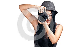 Young asian girl taking a photo