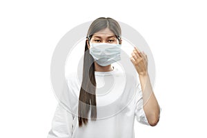 Young asian girl wearing medical mask