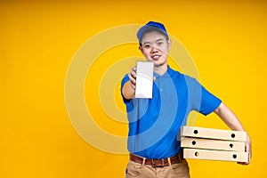 Young Asian handsome delivery man holding box on left arm and showing application on mobile