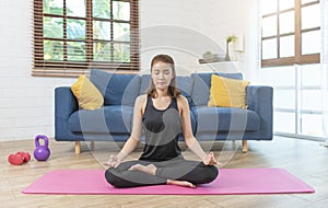 Young Asian healthy woman in sportswear workout at home, exercise, fit, doing yoga. home sport fitness concept