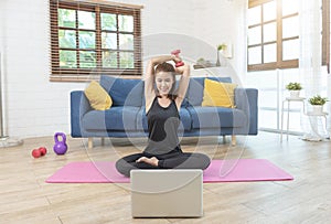 Young Asian healthy woman in sportswear workout at home, exercise, fit, doing yoga. home sport fitness concept