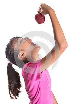 Young Asian Malay Teenager Eating Red Apple IV