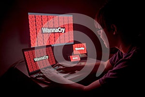 Young Asian male frustrated by WannaCry ransomware attack