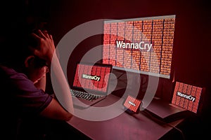 Young Asian male frustrated by WannaCry ransomware attack